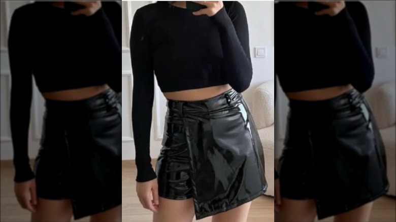 woman wearing black leather skort