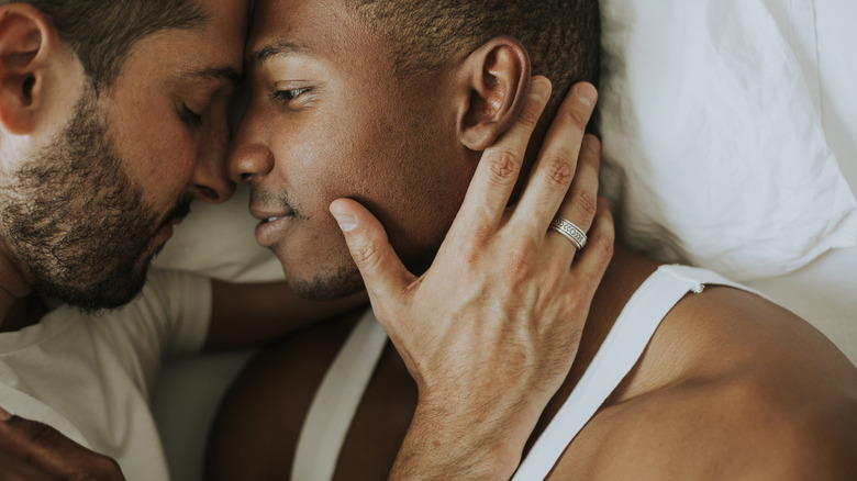 couple embracing in bed