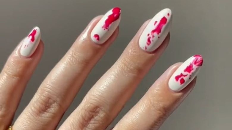 White nails with red splatter