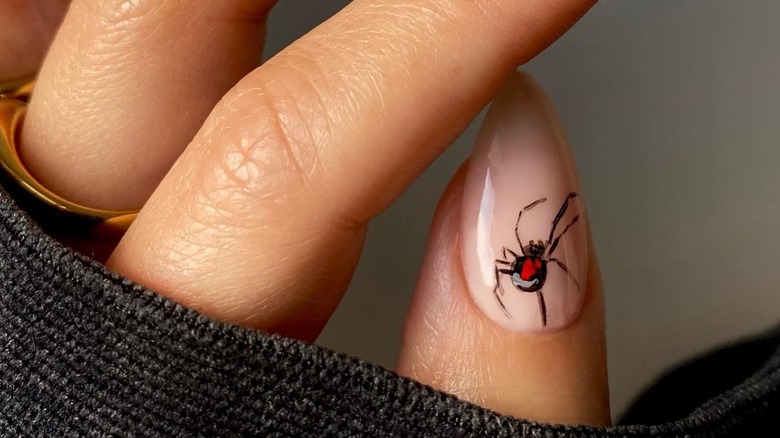 Clear nails with spider design