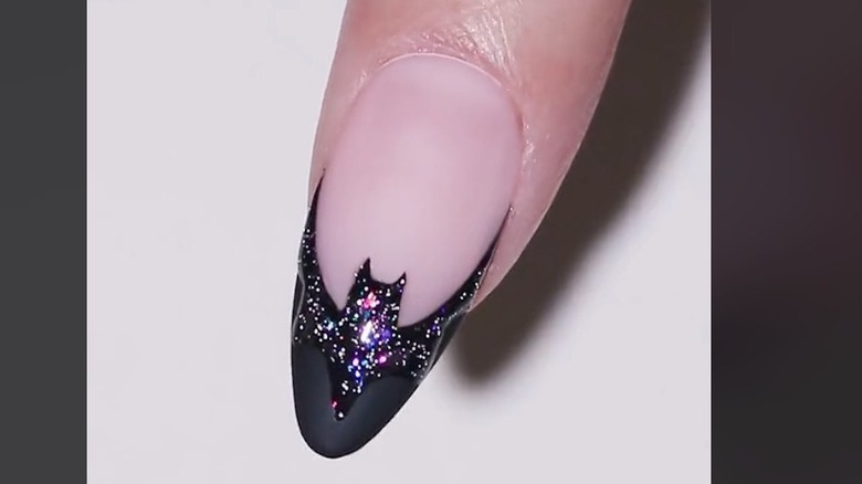 Pink nails with black bat tips