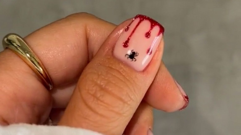 spider and blood manicure nails