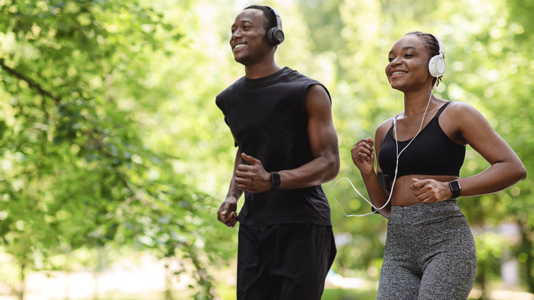 jogging couple in park