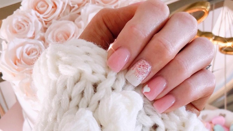 Pink nails white polish with glitter