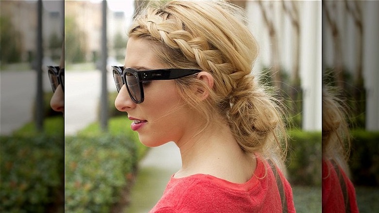 Woman with a braided low bun