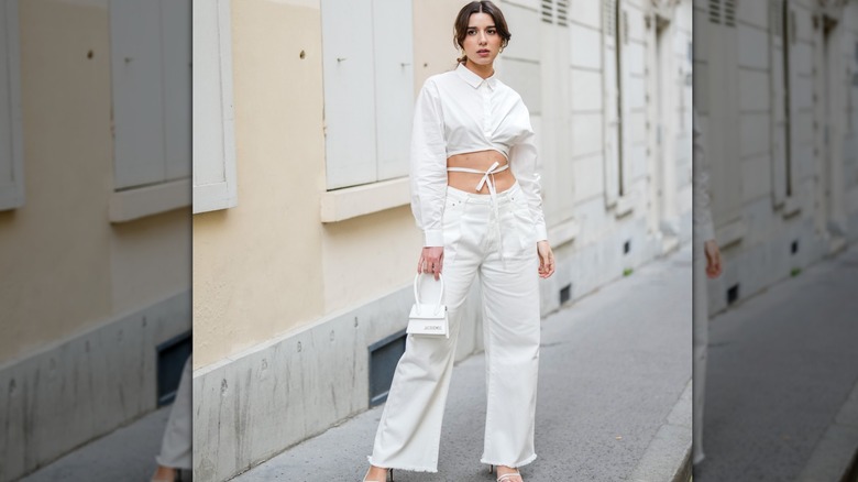 White cropped top white mid-rise jeans