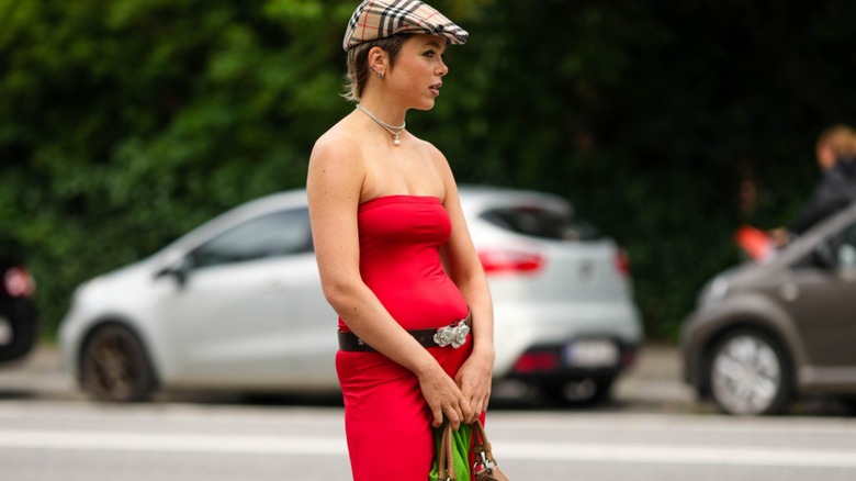 Woman wearing sleeveless red dress