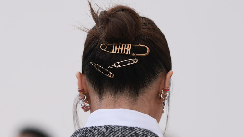 wearing Dior hair clips