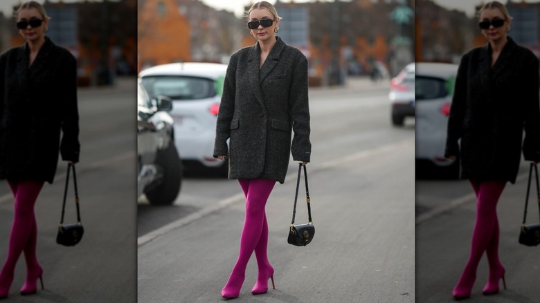 woman wearing magenta sock heels