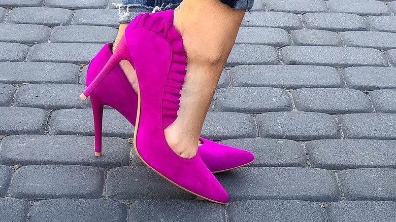 woman wearing magenta heels