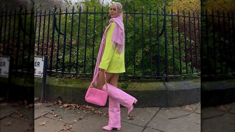 Model wearing pastel pink boots