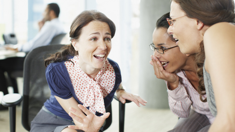 coworkers talking at work