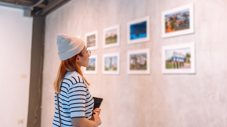 woman visiting art gallery