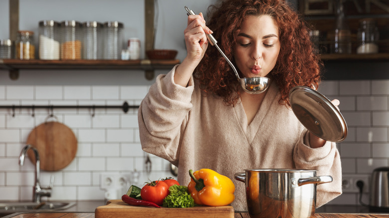 woman cooking in kitchen