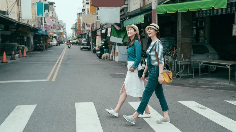 two women walking around town