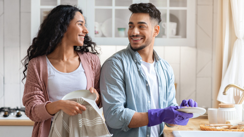 couple doing dishes together