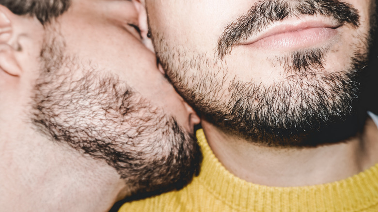 two men kissing