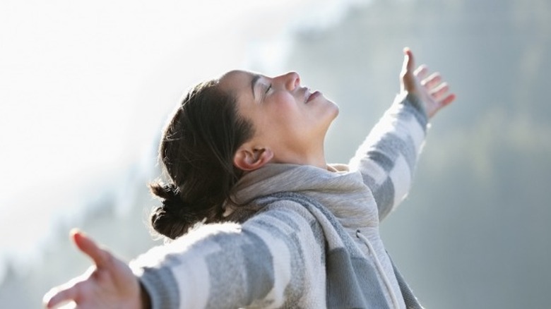 Woman basking in the sunlight