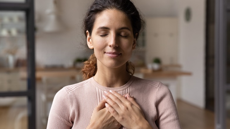 woman feeling and showing gratitude