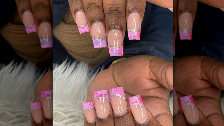 Instagram user @nailsbycheni showing pink marbled french manicure