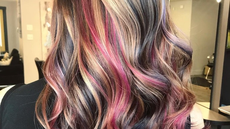 person with multicolored marbled hair