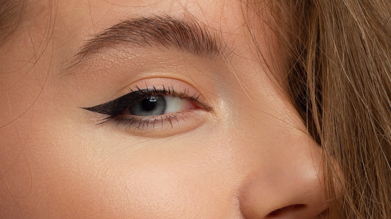 woman cat wing eye liner