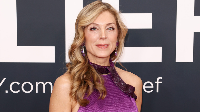 Marla Maples posing in a purple gown at the 2025 Grammy Awards