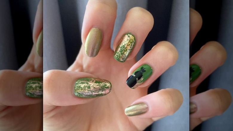 gold green and black nails