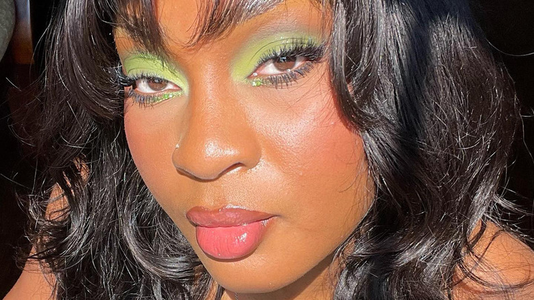 Bright green eyeshadow pink lipstick
