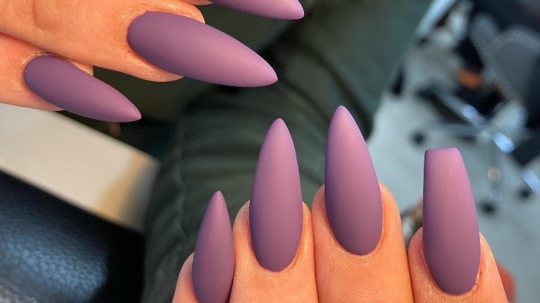 close up of purple matte nails 