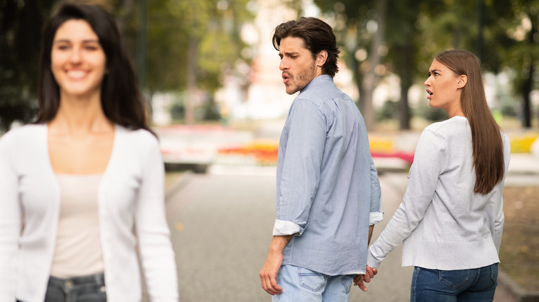 Boyfriend walking with girlfriend