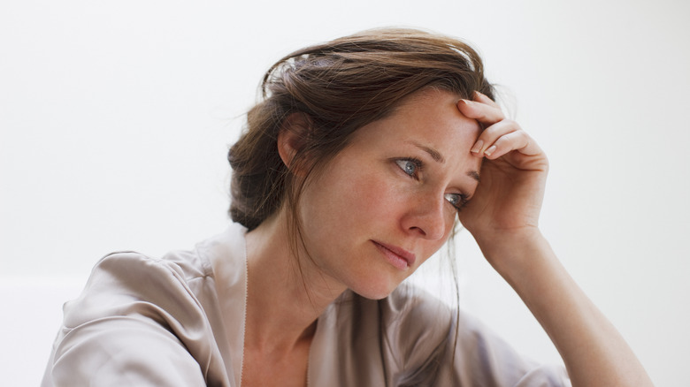 sad woman looking like she wants to give up