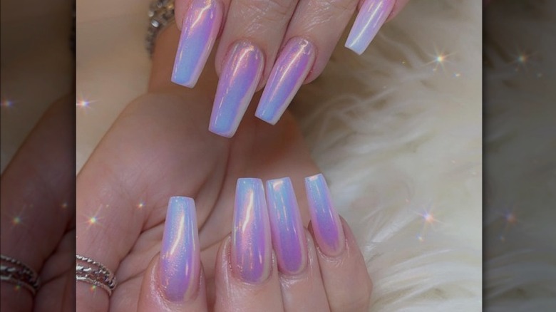 Woman with ombre iridescent manicure