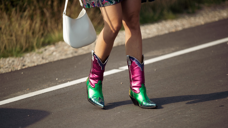 woman wearing metallic boots