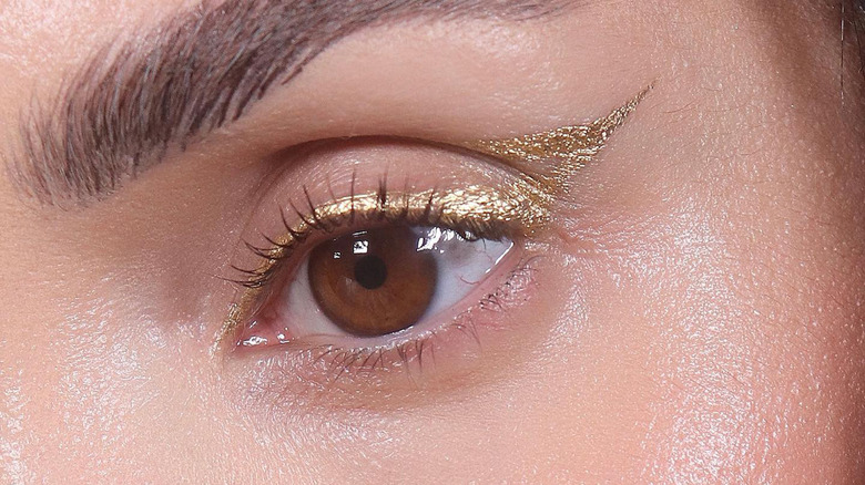 Gold winged eyeliner