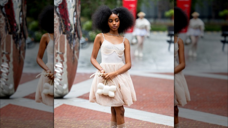 woman wearing high-waisted dress