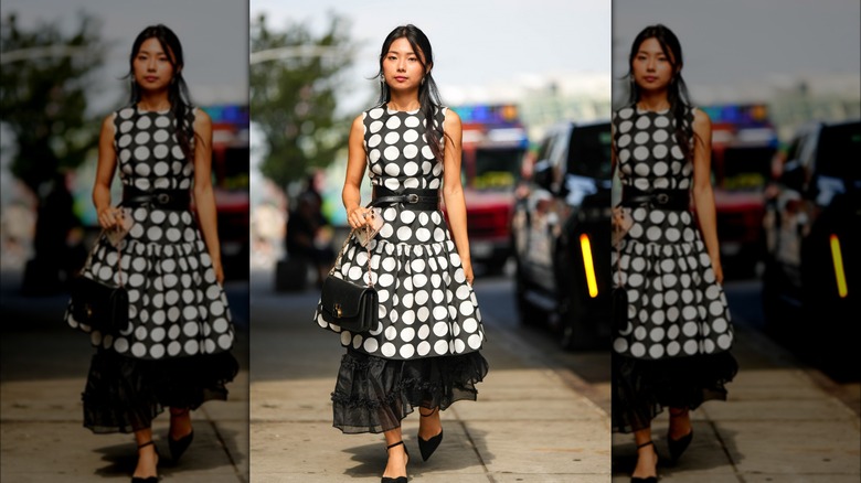 woman wearing dress and belt