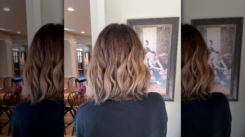 woman showing back of hair color