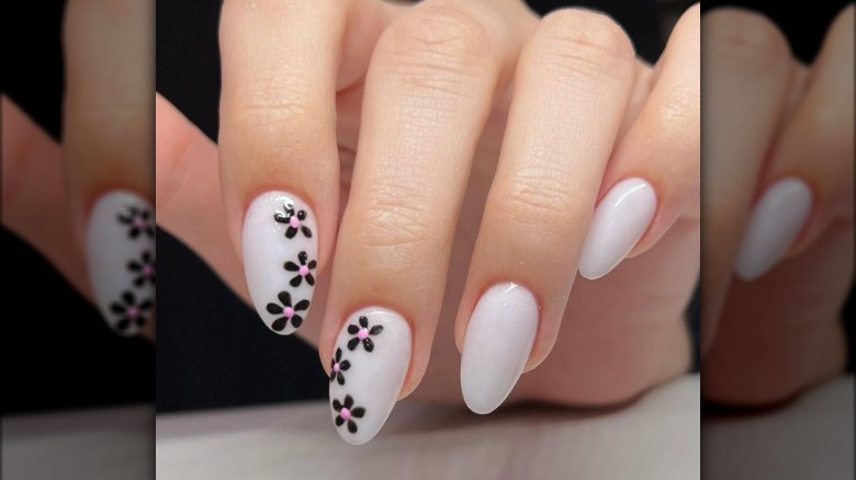 Milky white nails with design