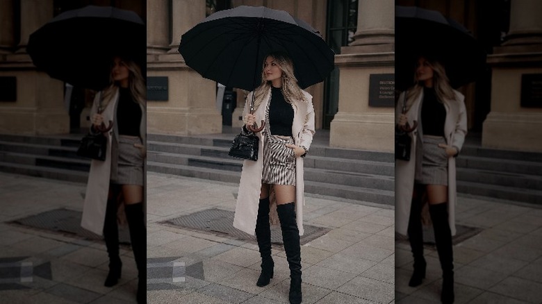 woman holding umbrella