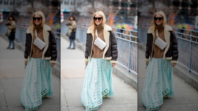 Girl wearing a mint maxi skirt