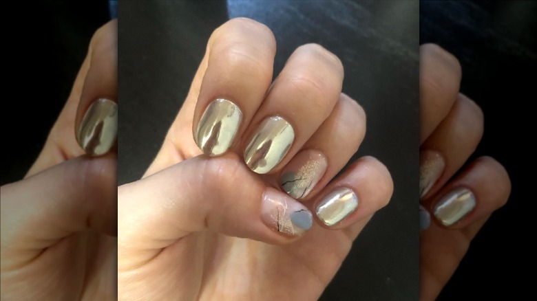 hand with mirrored nails