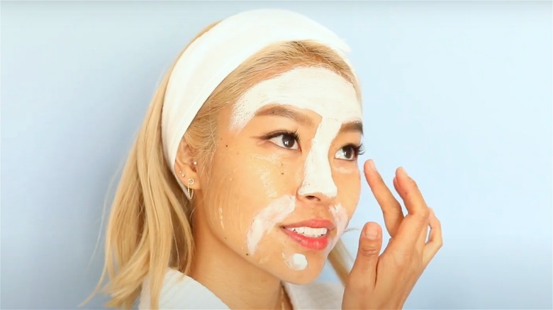 Woman wearing multiple face masks