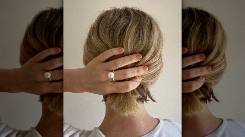 Girl wearing a pearl ring