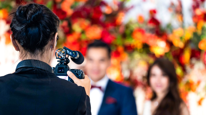 Wedding photographer capturing a wedding 