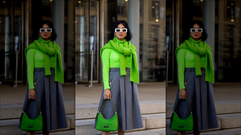 woman wearing green sweater