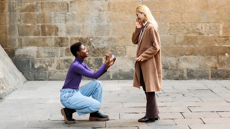 woman proposing to girlfriend