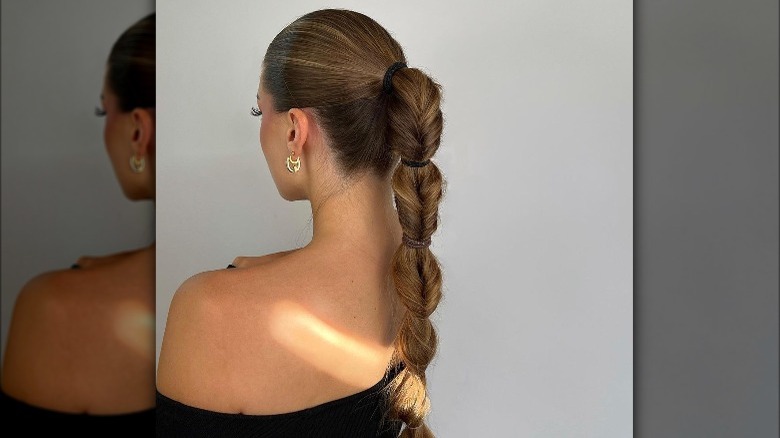 woman with long bubble ponytail