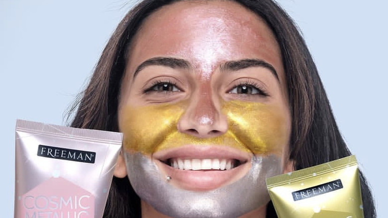 woman smiling while multimasking