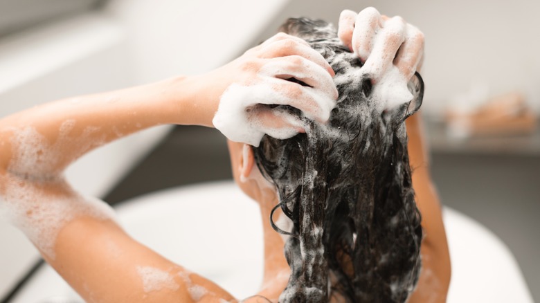 A woman washing her hair